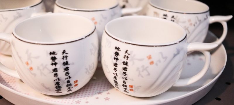 中国传统汉字大写数字体系展示图，壹贰叁肆伍陆柒捌玖拾排列，配合古典纸张纹理，体现玖字的历史文化背景
